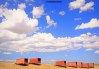 Accommodation capsules under the vast sky at Charyn Canyon in Kazakhstan.